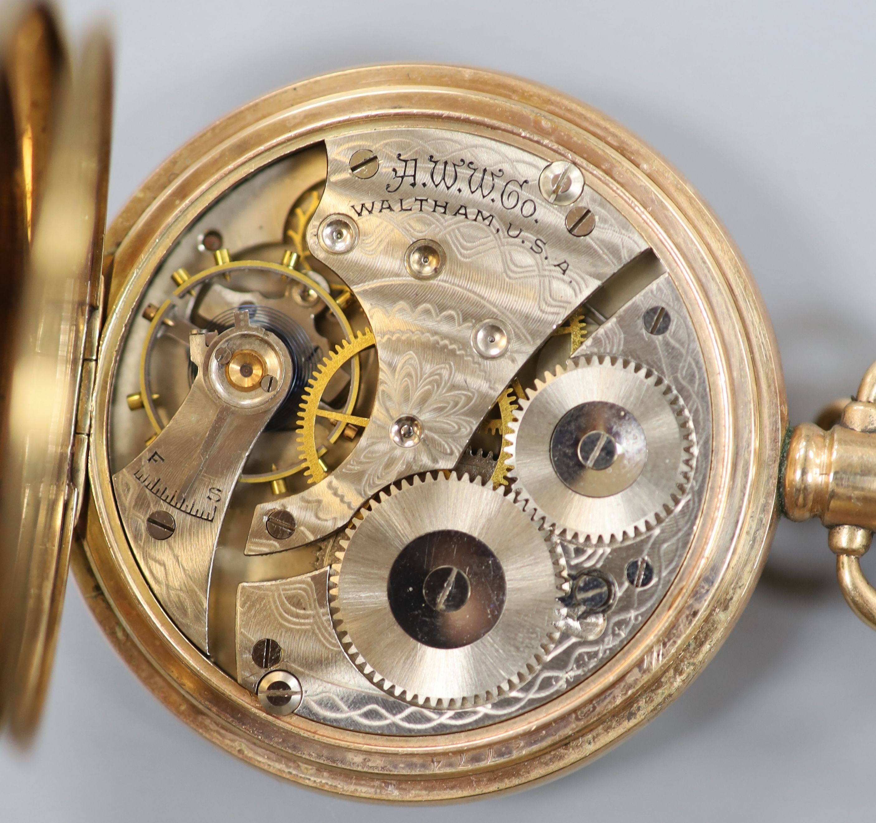 A 9ct gold albert, 44cm, 31.7 grams, together with a gold plated Waltham hunter pocket watch.